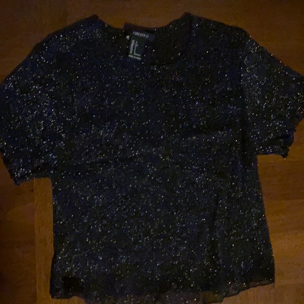 I’m selling a crop top brand is forever 21 size is small clot is black